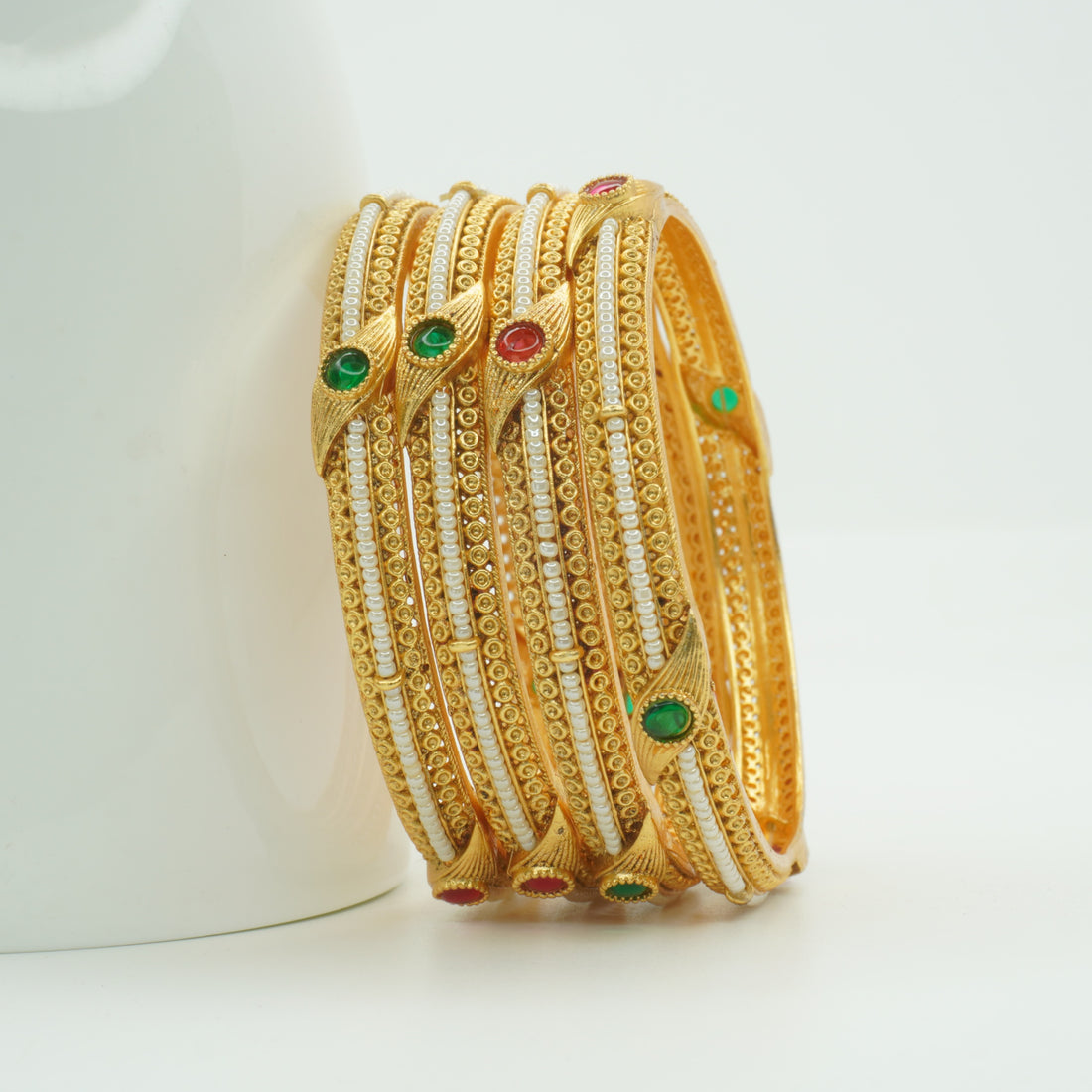 Trending Designer Gold Bangles with Pearl Ruby Emerald Stones for Bridal & Festive Look